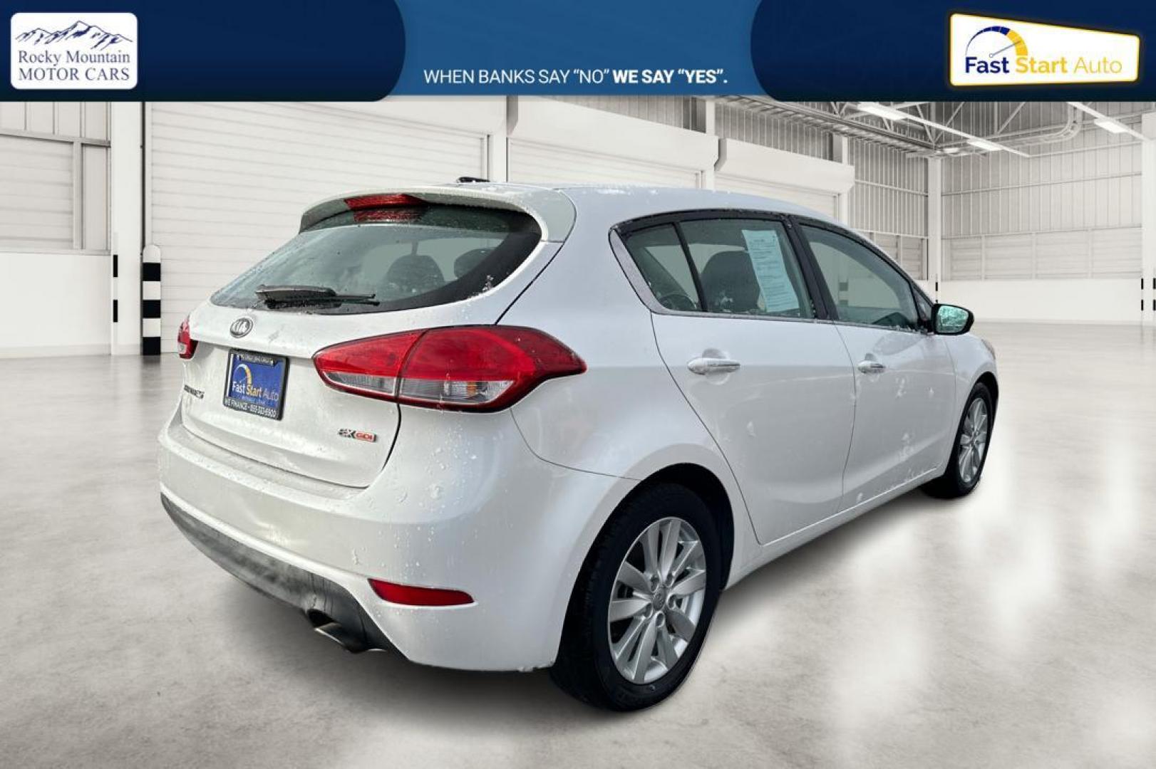 2015 White Kia Forte 5-Door EX (KNAFX5A83F5) with an 2.0L L4 DOHC 16V engine, 6-Speed Automatic transmission, located at 7755 State Street, Midvale, UT, 84047, (801) 753-9063, 40.610329, -111.890656 - Photo#2