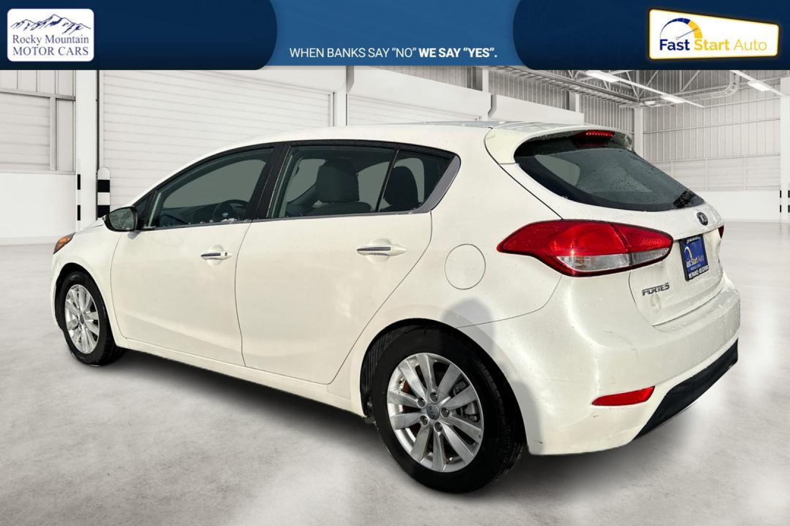 2015 White Kia Forte 5-Door EX (KNAFX5A83F5) with an 2.0L L4 DOHC 16V engine, 6-Speed Automatic transmission, located at 7755 State Street, Midvale, UT, 84047, (801) 753-9063, 40.610329, -111.890656 - Photo#5