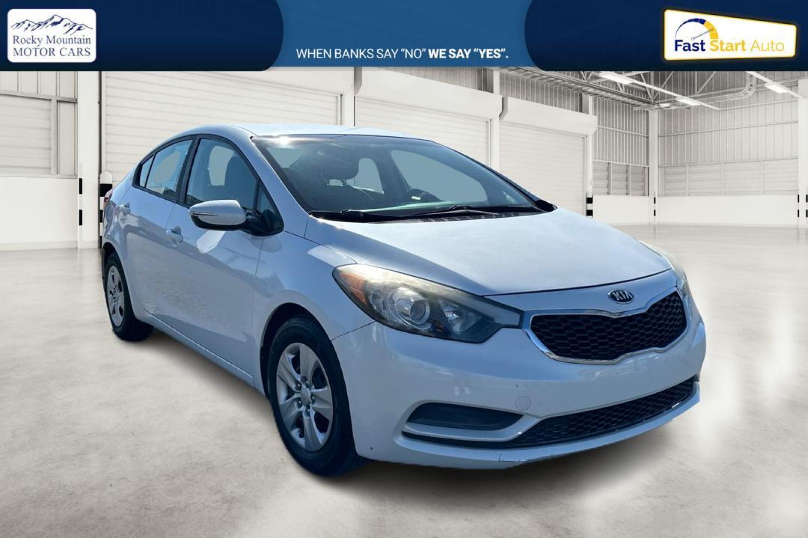 2015 White Kia Forte EX (KNAFX4A61F5) with an 1.8L L4 DOHC 16V engine, 6-Speed Automatic transmission, located at 344 S Washington Blvd, Ogden, UT, 84404, (801) 399-1799, 41.255482, -111.970848 - Photo#0