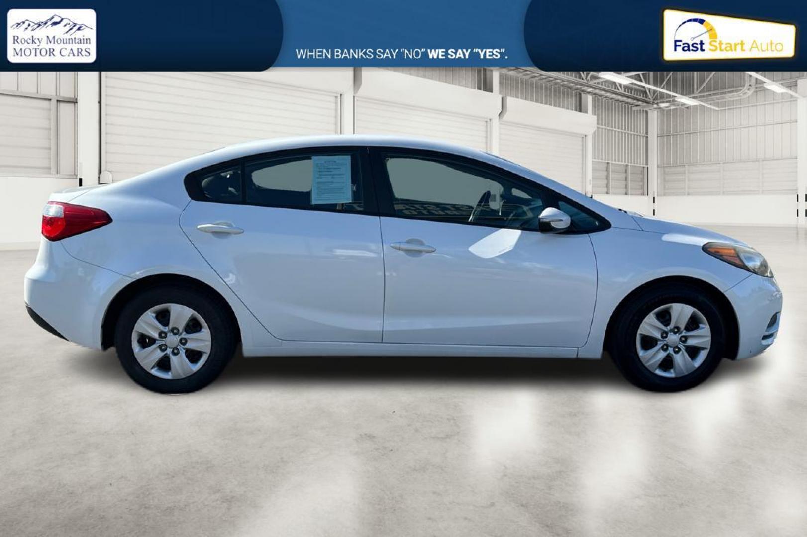 2015 White Kia Forte EX (KNAFX4A61F5) with an 1.8L L4 DOHC 16V engine, 6-Speed Automatic transmission, located at 344 S Washington Blvd, Ogden, UT, 84404, (801) 399-1799, 41.255482, -111.970848 - Photo#1