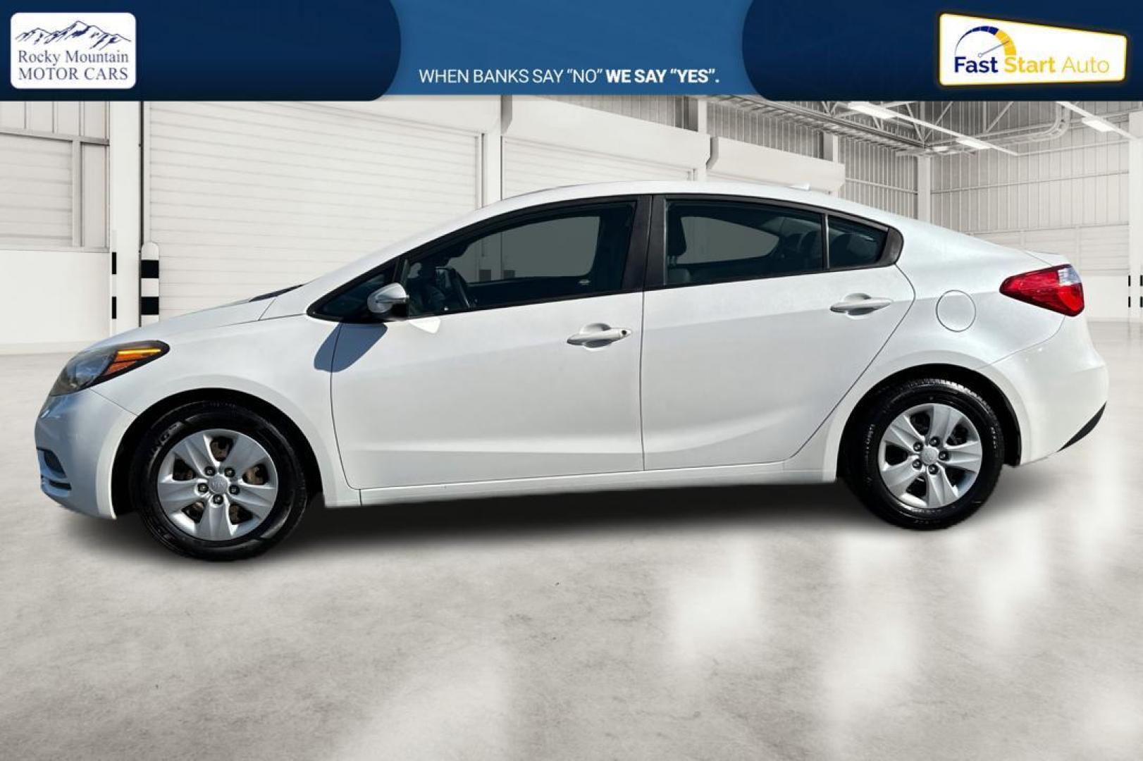 2015 White Kia Forte EX (KNAFX4A61F5) with an 1.8L L4 DOHC 16V engine, 6-Speed Automatic transmission, located at 344 S Washington Blvd, Ogden, UT, 84404, (801) 399-1799, 41.255482, -111.970848 - Photo#6