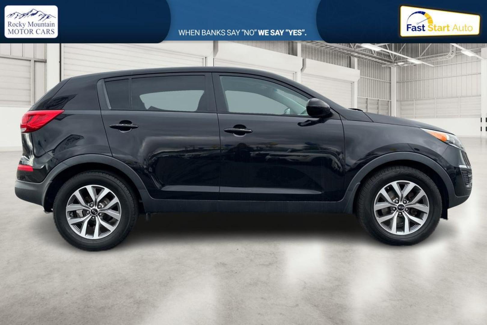 2015 Black Kia Sportage LX FWD (KNDPB3ACXF7) with an 2.4L V6 DOHC 24V engine, 6-Speed Automatic transmission, located at 7755 State Street, Midvale, UT, 84047, (801) 753-9063, 40.610329, -111.890656 - Photo#1