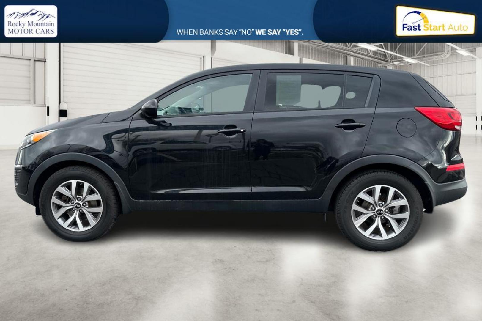 2015 Black Kia Sportage LX FWD (KNDPB3ACXF7) with an 2.4L V6 DOHC 24V engine, 6-Speed Automatic transmission, located at 7755 State Street, Midvale, UT, 84047, (801) 753-9063, 40.610329, -111.890656 - Photo#5