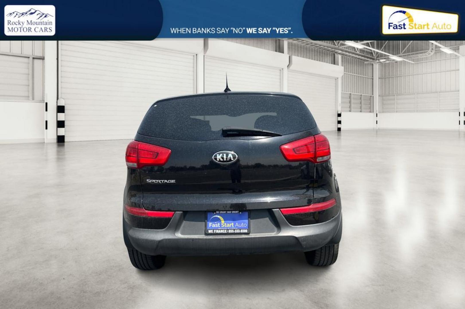 2015 Black Kia Sportage LX FWD (KNDPB3ACXF7) with an 2.4L V6 DOHC 24V engine, 6-Speed Automatic transmission, located at 767 S State Road, Pleasant Grove, UT, 84062, (801) 785-1058, 40.354839, -111.736687 - Photo#4