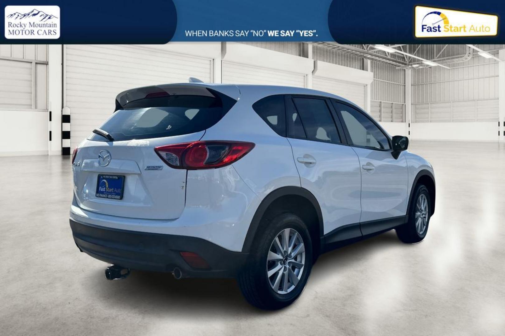 2015 White Mazda CX-5 Sport AT (JM3KE2BE4F0) with an 2.5L L4 DOHC 16V engine, 6-Speed Automatic transmission, located at 7755 State Street, Midvale, UT, 84047, (801) 753-9063, 40.610329, -111.890656 - Photo#2