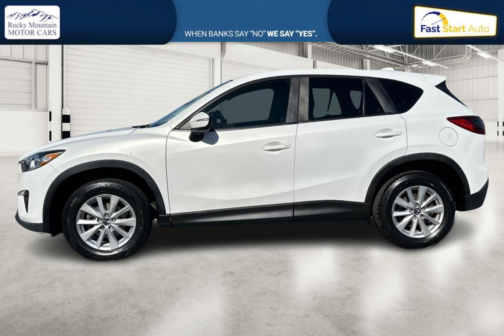 2015 White Mazda CX-5 Sport AT (JM3KE2BE4F0) with an 2.5L L4 DOHC 16V engine, 6-Speed Automatic transmission, located at 7755 State Street, Midvale, UT, 84047, (801) 753-9063, 40.610329, -111.890656 - Photo#6