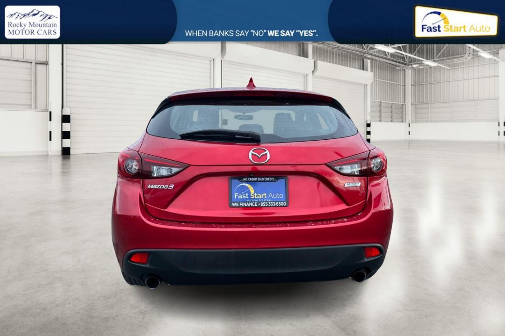 2015 Red Mazda MAZDA3 i Grand Touring AT 5-Door (JM1BM1M75F1) with an 2.0L L4 DOHC 16V engine, 6-Speed Automatic transmission, located at 7755 State Street, Midvale, UT, 84047, (801) 753-9063, 40.610329, -111.890656 - Photo#4