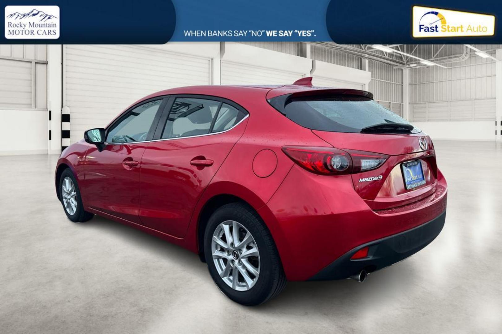 2015 Red Mazda MAZDA3 i Grand Touring AT 5-Door (JM1BM1M75F1) with an 2.0L L4 DOHC 16V engine, 6-Speed Automatic transmission, located at 7755 State Street, Midvale, UT, 84047, (801) 753-9063, 40.610329, -111.890656 - Photo#5