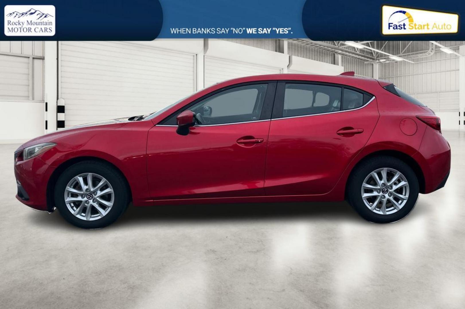 2015 Red Mazda MAZDA3 i Grand Touring AT 5-Door (JM1BM1M75F1) with an 2.0L L4 DOHC 16V engine, 6-Speed Automatic transmission, located at 7755 State Street, Midvale, UT, 84047, (801) 753-9063, 40.610329, -111.890656 - Photo#6