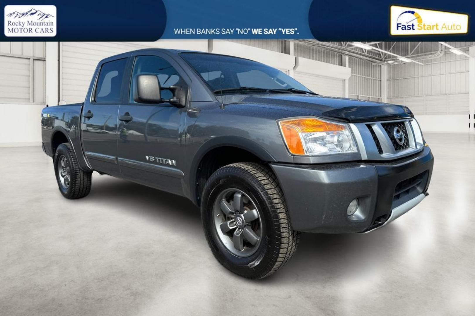 2015 Gray Nissan Titan PRO-4X Crew Cab 4WD SWB (1N6AA0ECXFN) with an 5.6L V8 DOHC 32V engine, 5-Speed Automatic transmission, located at 7755 State Street, Midvale, UT, 84047, (801) 753-9063, 40.610329, -111.890656 - Photo#0