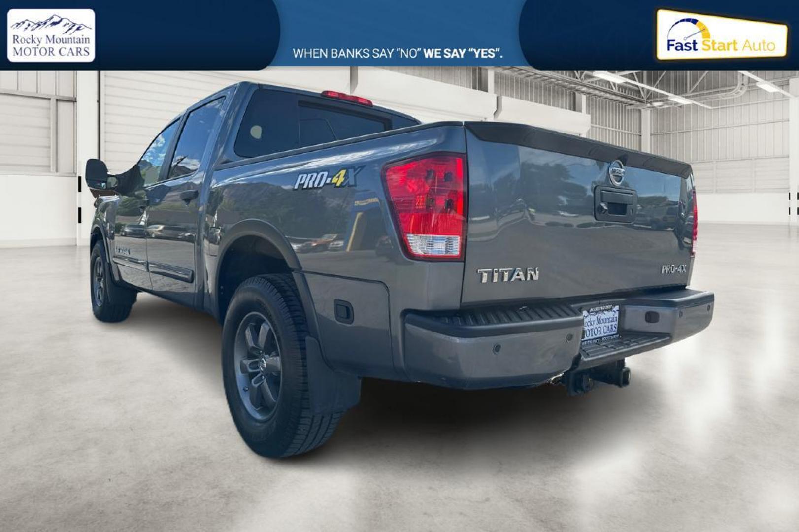 2015 Gray Nissan Titan PRO-4X Crew Cab 4WD SWB (1N6AA0ECXFN) with an 5.6L V8 DOHC 32V engine, 5-Speed Automatic transmission, located at 7755 State Street, Midvale, UT, 84047, (801) 753-9063, 40.610329, -111.890656 - Photo#4