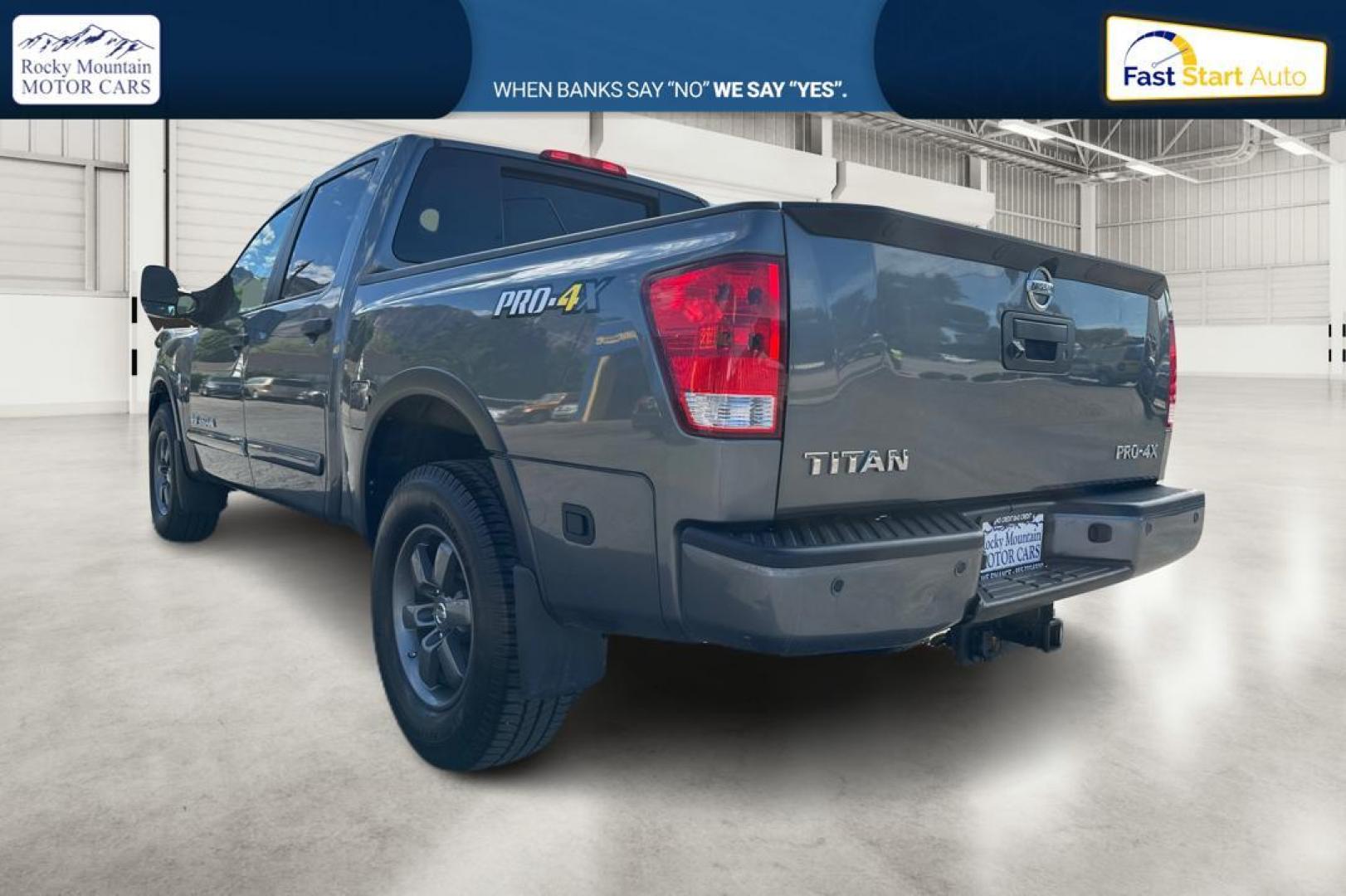 2015 Gray Nissan Titan PRO-4X Crew Cab 4WD SWB (1N6AA0ECXFN) with an 5.6L V8 DOHC 32V engine, 5-Speed Automatic transmission, located at 767 S State Road, Pleasant Grove, UT, 84062, (801) 785-1058, 40.354839, -111.736687 - Photo#2