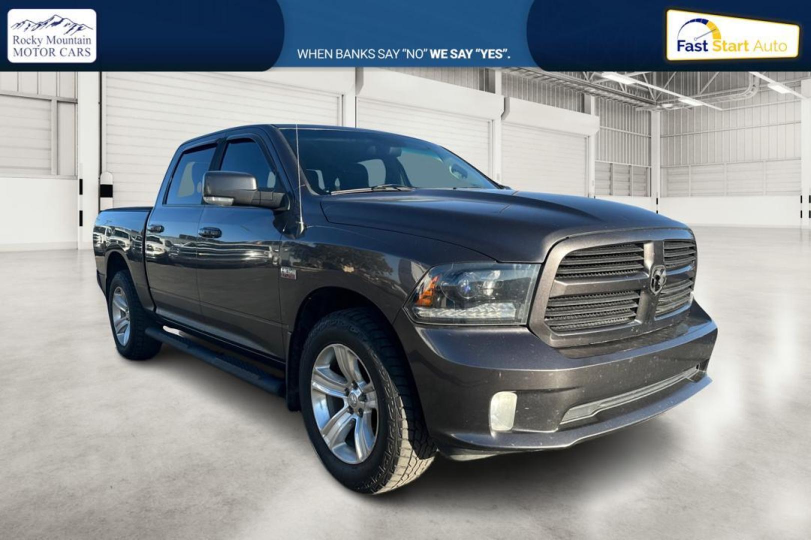 2015 Gray RAM 1500 Sport Crew Cab SWB 4WD (1C6RR7MT1FS) with an 5.7L V8 OHV 16V engine, 6-Speed Automatic transmission, located at 7755 State Street, Midvale, UT, 84047, (801) 753-9063, 40.610329, -111.890656 - Photo#0