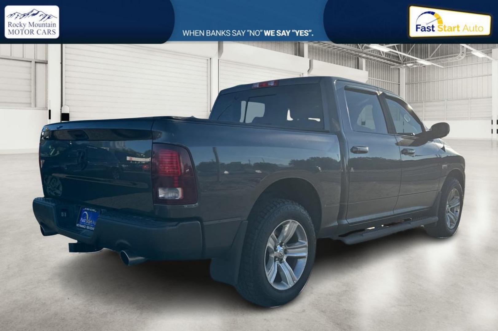 2015 Gray RAM 1500 Sport Crew Cab SWB 4WD (1C6RR7MT1FS) with an 5.7L V8 OHV 16V engine, 6-Speed Automatic transmission, located at 7755 State Street, Midvale, UT, 84047, (801) 753-9063, 40.610329, -111.890656 - Photo#2