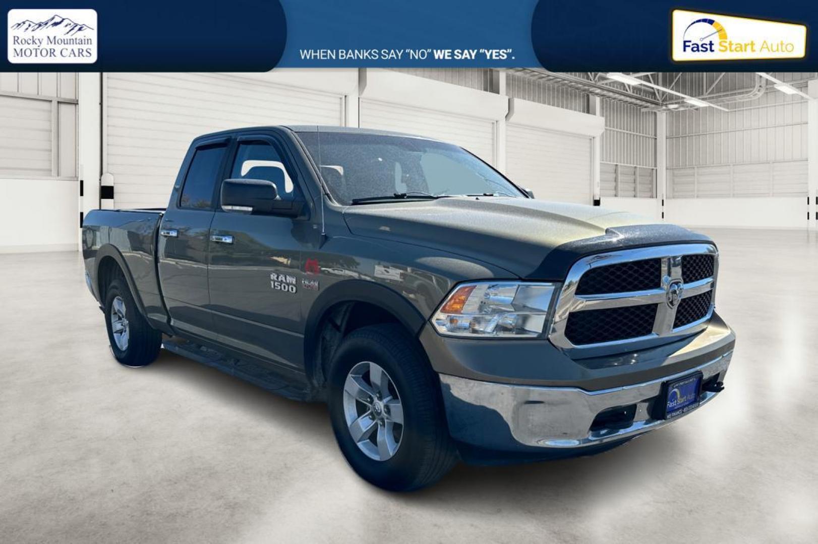 2015 Gold RAM 1500 SLT Quad Cab 4WD (1C6RR7GT8FS) with an 5.7L V8 OHV 16V engine, 6-Speed Automatic transmission, located at 7755 State Street, Midvale, UT, 84047, (801) 753-9063, 40.610329, -111.890656 - Photo#0