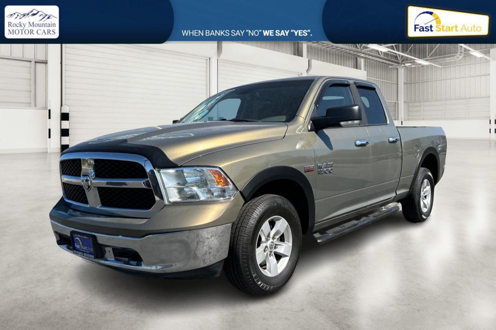 2015 Gold RAM 1500 SLT Quad Cab 4WD (1C6RR7GT8FS) with an 5.7L V8 OHV 16V engine, 6-Speed Automatic transmission, located at 7755 State Street, Midvale, UT, 84047, (801) 753-9063, 40.610329, -111.890656 - Photo#8