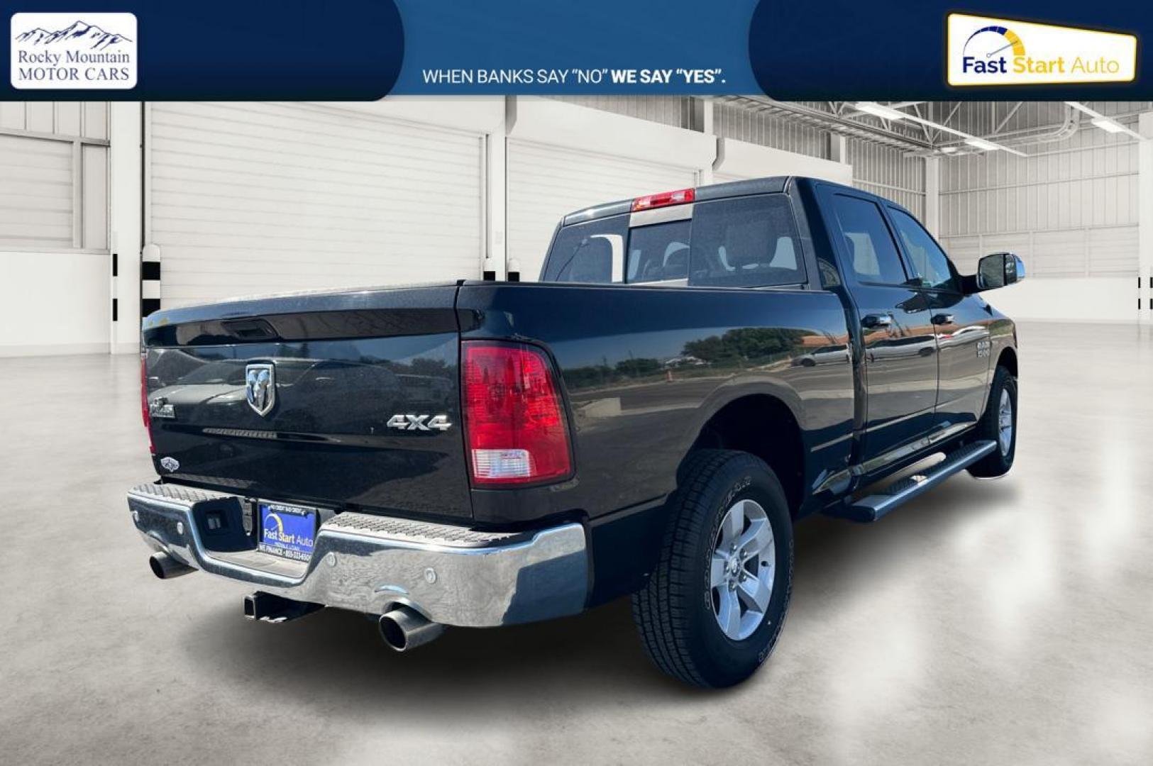 2015 Black RAM 1500 SLT Crew Cab LWB 4WD (1C6RR7TT6FS) with an 5.7L V8 OHV 16V engine, 6-Speed Automatic transmission, located at 344 S Washington Blvd, Ogden, UT, 84404, (801) 399-1799, 41.255482, -111.970848 - Photo#2