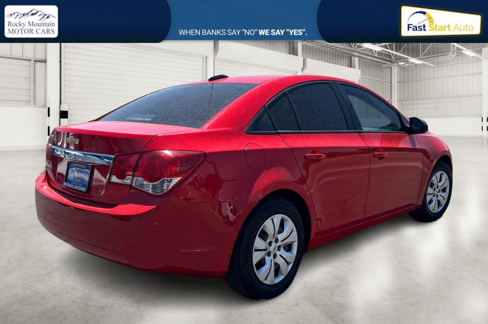 2016 Red Chevrolet Cruze Limited LS Manual (1G1PB5SG4G7) with an 1.8L L4 DOHC 16V engine, 6M transmission, located at 344 S Washington Blvd, Ogden, UT, 84404, (801) 399-1799, 41.255482, -111.970848 - Photo#2