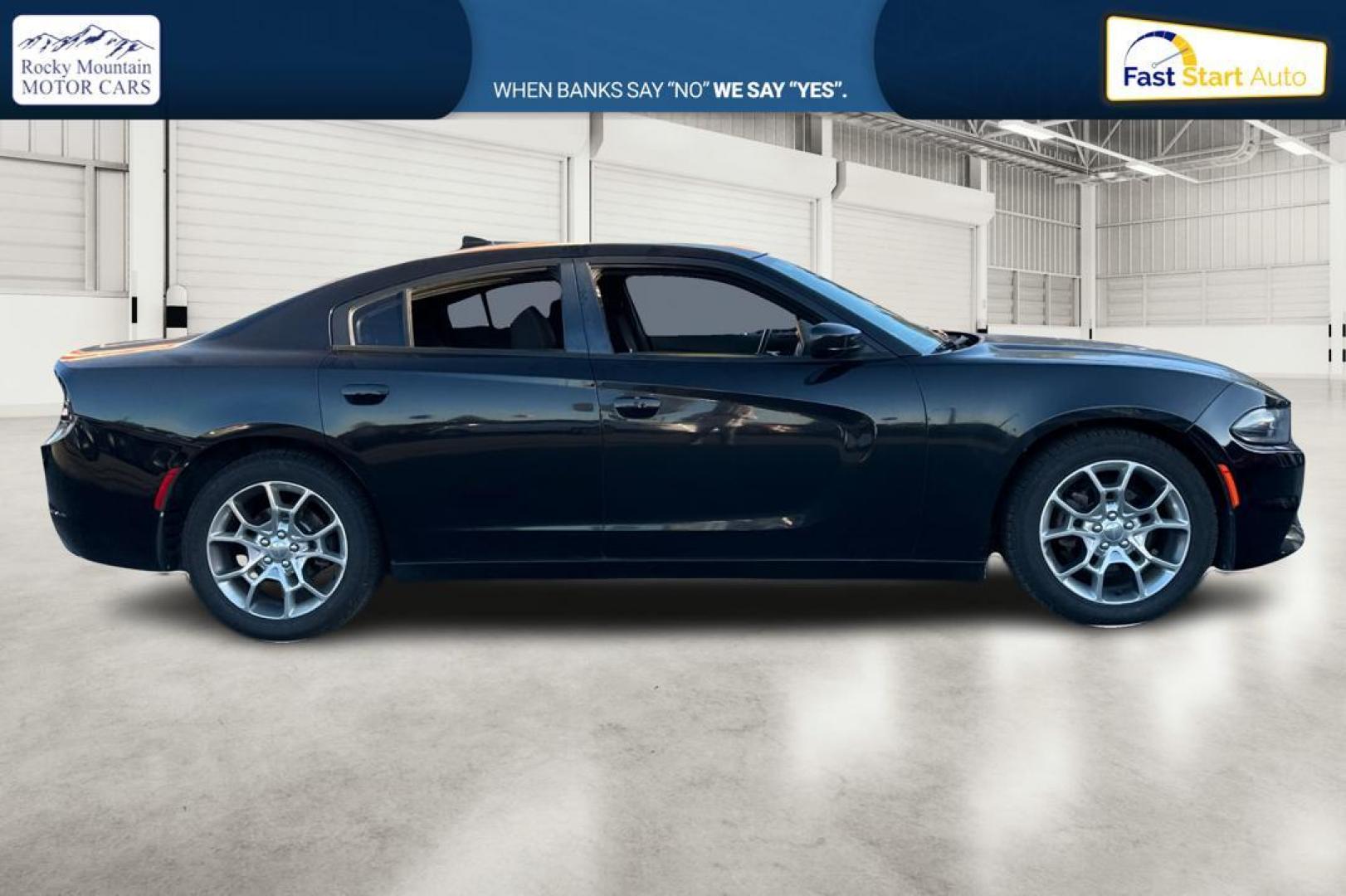 2016 Black Dodge Charger SXT (2C3CDXHG9GH) with an 3.6L V6 DOHC 24V engine, 8A transmission, located at 344 S Washington Blvd, Ogden, UT, 84404, (801) 399-1799, 41.255482, -111.970848 - Photo#1