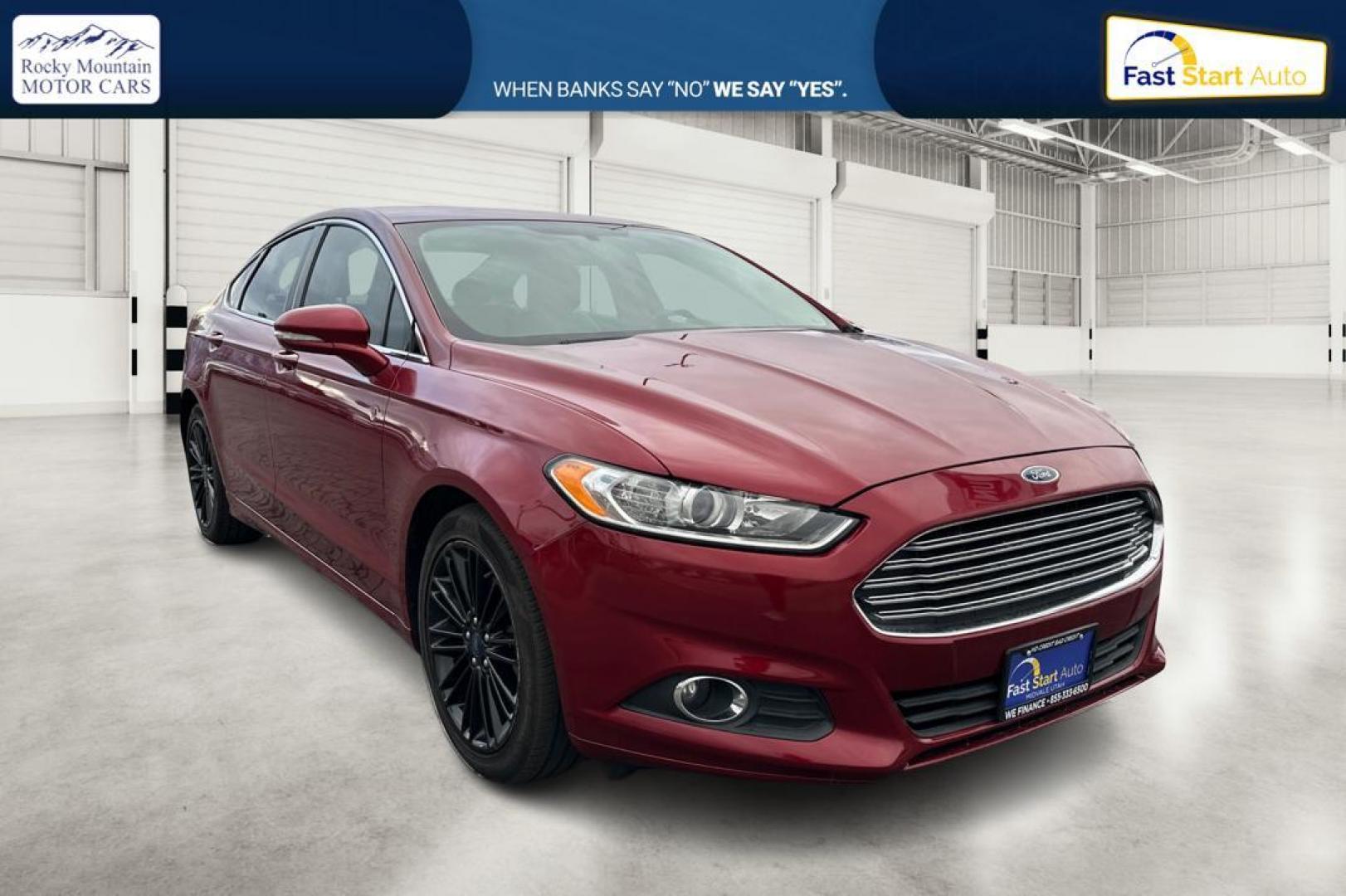 2016 Red Ford Fusion SE (1FA6P0HD4G5) with an 1.5L L4 DOHC 16V engine, 6-Speed Automatic transmission, located at 344 S Washington Blvd, Ogden, UT, 84404, (801) 399-1799, 41.255482, -111.970848 - Photo#0