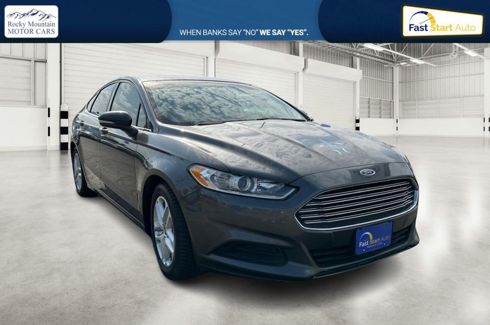 2016 Gray Ford Fusion SE (3FA6P0H7XGR) with an 2.5L L4 DOHC 16V engine, 6-Speed Automatic transmission, located at 7755 State Street, Midvale, UT, 84047, (801) 753-9063, 40.610329, -111.890656 - Photo#0