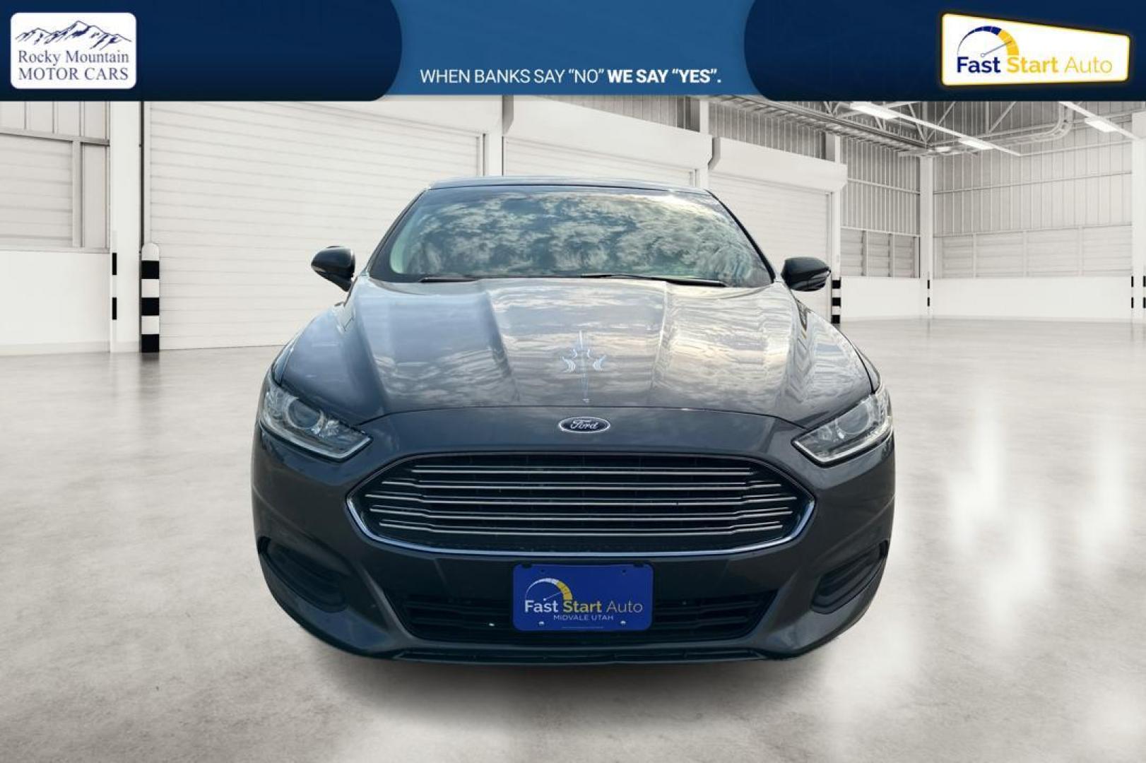 2016 Gray Ford Fusion SE (3FA6P0H7XGR) with an 2.5L L4 DOHC 16V engine, 6-Speed Automatic transmission, located at 7755 State Street, Midvale, UT, 84047, (801) 753-9063, 40.610329, -111.890656 - Photo#7