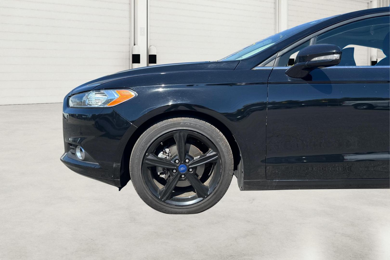 2016 Black Ford Fusion SE (3FA6P0HD8GR) with an 1.5L L4 DOHC 16V engine, 6-Speed Automatic transmission, located at 344 S Washington Blvd, Ogden, UT, 84404, (801) 399-1799, 41.255482, -111.970848 - Photo#9