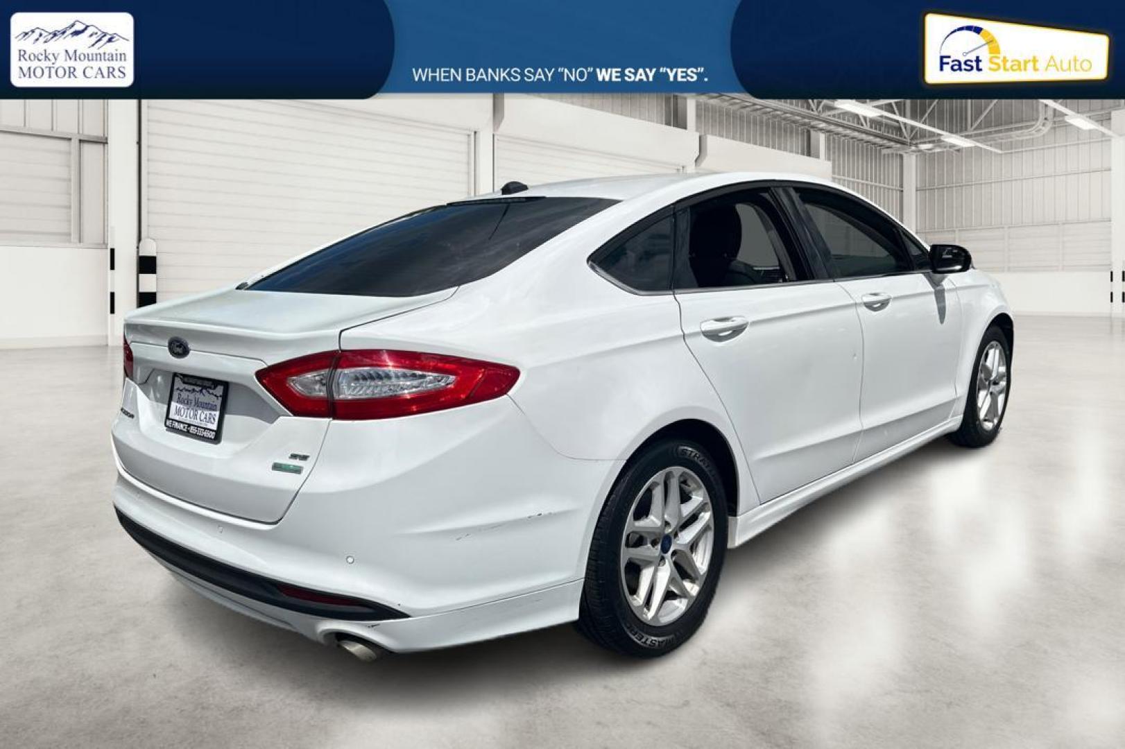 2016 White Ford Fusion SE (3FA6P0HD1GR) with an 1.5L L4 DOHC 16V engine, 6-Speed Automatic transmission, located at 767 S State Road, Pleasant Grove, UT, 84062, (801) 785-1058, 40.354839, -111.736687 - Photo#2