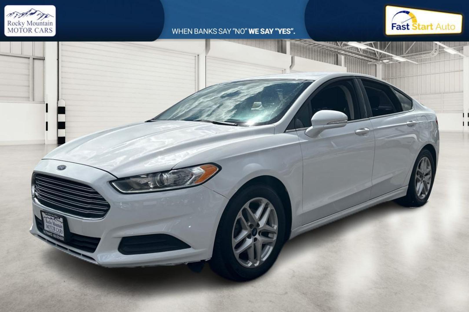 2016 White Ford Fusion SE (3FA6P0HD1GR) with an 1.5L L4 DOHC 16V engine, 6-Speed Automatic transmission, located at 767 S State Road, Pleasant Grove, UT, 84062, (801) 785-1058, 40.354839, -111.736687 - Photo#6