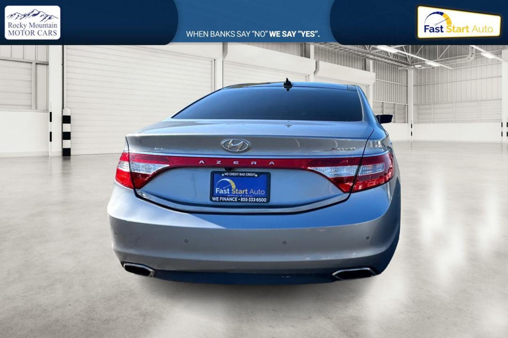 2016 Gray Hyundai Azera Limited (KMHFH4JG3GA) with an 3.3L V6 DOHC 24V engine, 6A transmission, located at 344 S Washington Blvd, Ogden, UT, 84404, (801) 399-1799, 41.255482, -111.970848 - Photo#4