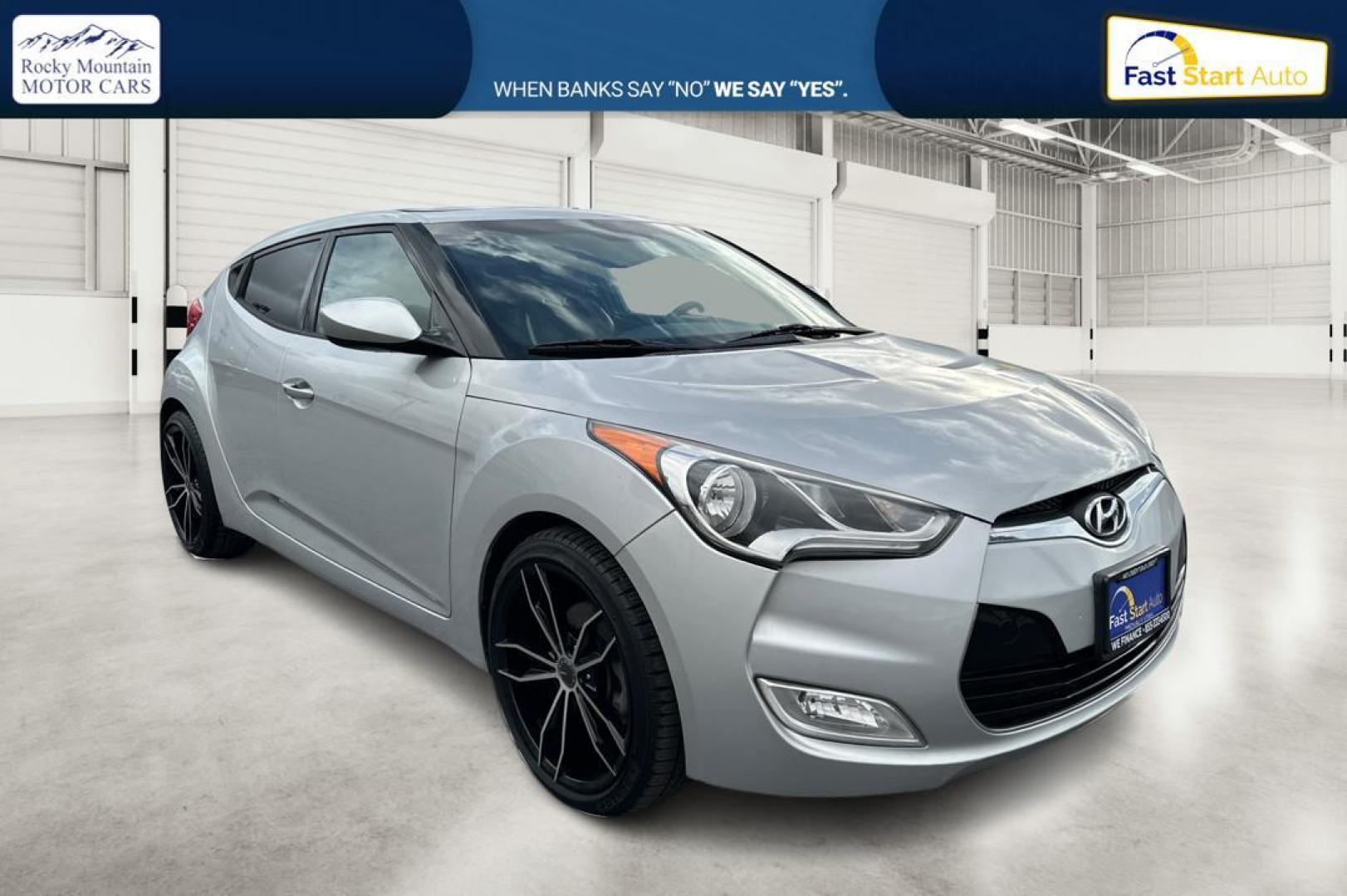 2016 Silver Hyundai Veloster Base 6MT (KMHTC6AD6GU) with an 1.6L L4 DOHC 16V engine, 6-Speed Manual transmission, located at 7755 State Street, Midvale, UT, 84047, (801) 753-9063, 40.610329, -111.890656 - Photo#0