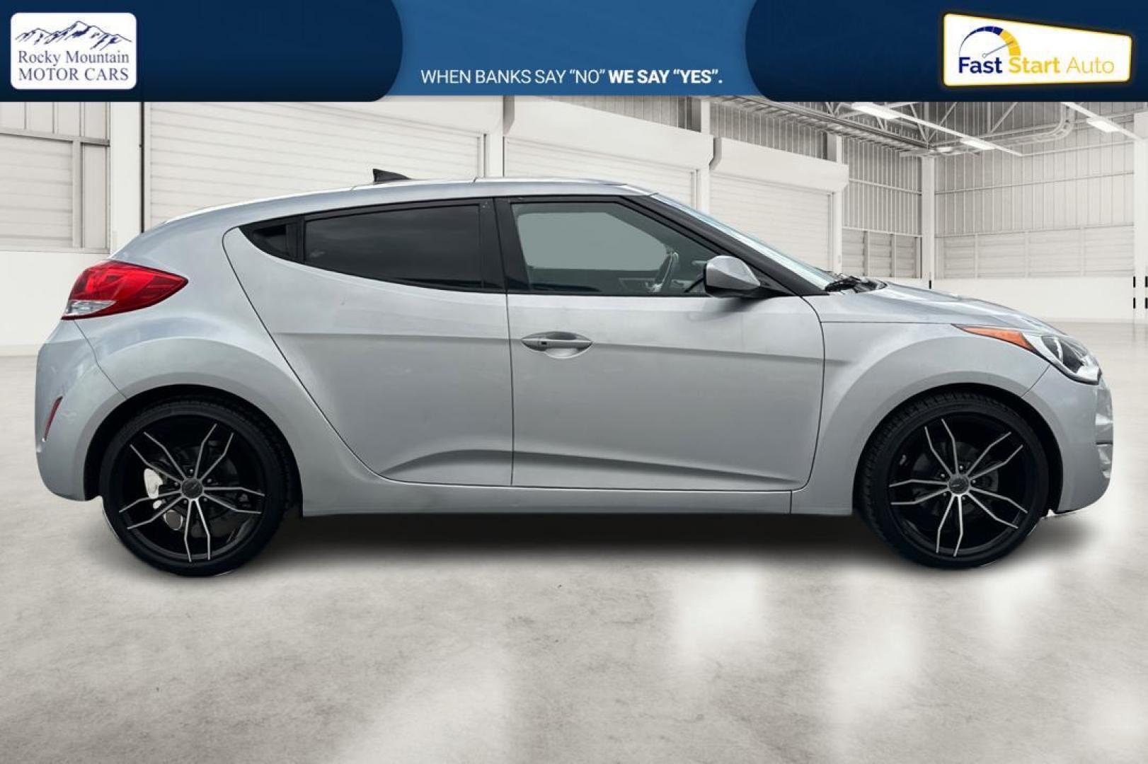 2016 Silver Hyundai Veloster Base 6MT (KMHTC6AD6GU) with an 1.6L L4 DOHC 16V engine, 6-Speed Manual transmission, located at 7755 State Street, Midvale, UT, 84047, (801) 753-9063, 40.610329, -111.890656 - Photo#1