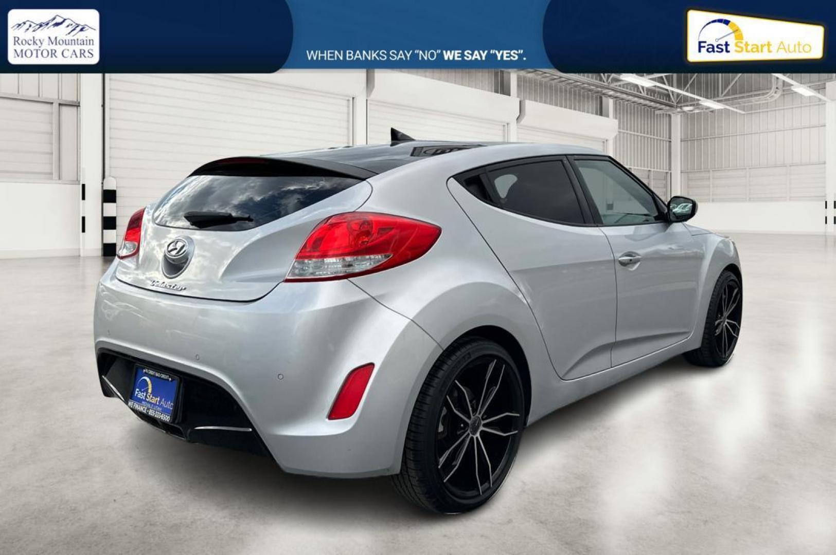 2016 Silver Hyundai Veloster Base 6MT (KMHTC6AD6GU) with an 1.6L L4 DOHC 16V engine, 6-Speed Manual transmission, located at 7755 State Street, Midvale, UT, 84047, (801) 753-9063, 40.610329, -111.890656 - Photo#2