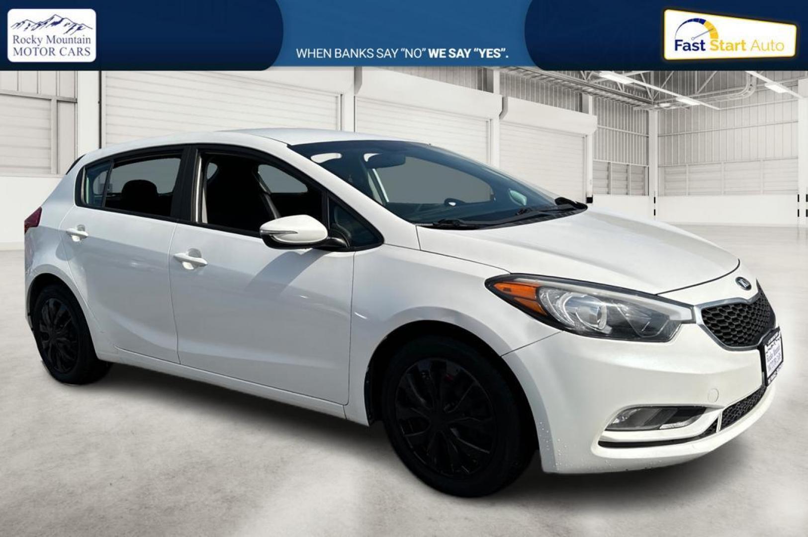 2016 White Kia Forte 5-Door LX (KNAFK5A84G5) with an 2.0L L4 DOHC 16V engine, 6-Speed Automatic transmission, located at 344 S Washington Blvd, Ogden, UT, 84404, (801) 399-1799, 41.255482, -111.970848 - Photo#0