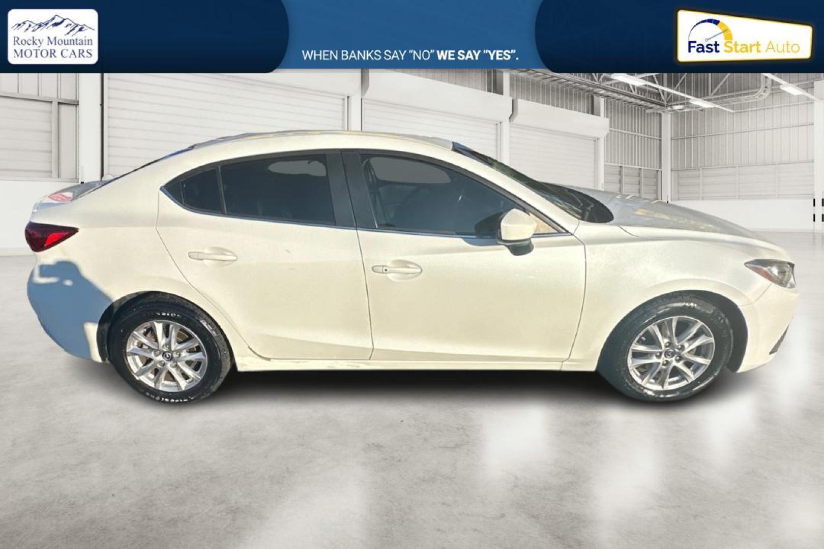 2016 White Mazda MAZDA3 i SE AT 4-Door (JM1BM1X79G1) with an 2.0L L4 DOHC 16V engine, 6A transmission, located at 7755 State Street, Midvale, UT, 84047, (801) 753-9063, 40.610329, -111.890656 - Photo#1