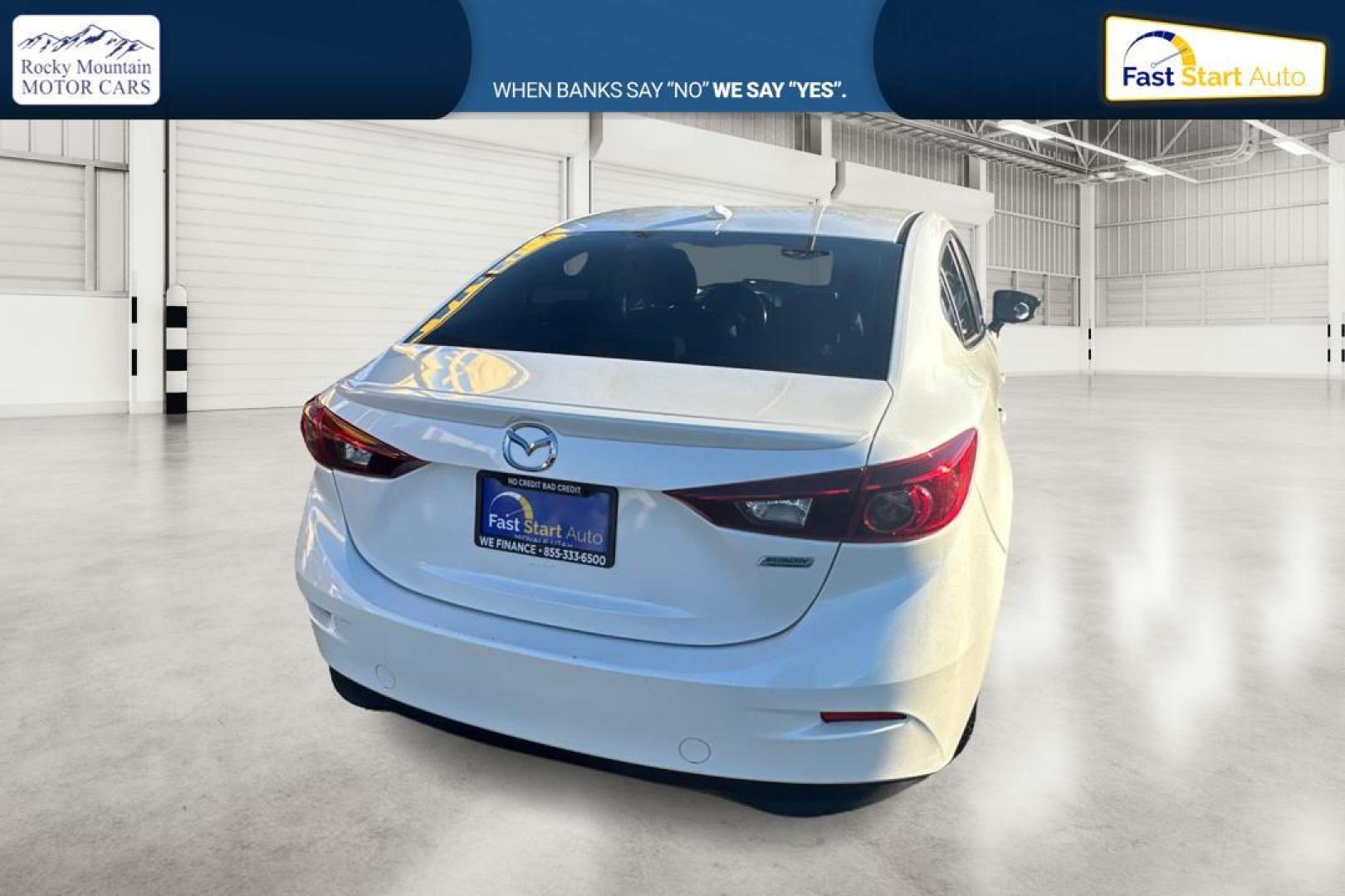 2016 White Mazda MAZDA3 i SE AT 4-Door (JM1BM1X79G1) with an 2.0L L4 DOHC 16V engine, 6A transmission, located at 7755 State Street, Midvale, UT, 84047, (801) 753-9063, 40.610329, -111.890656 - Photo#3