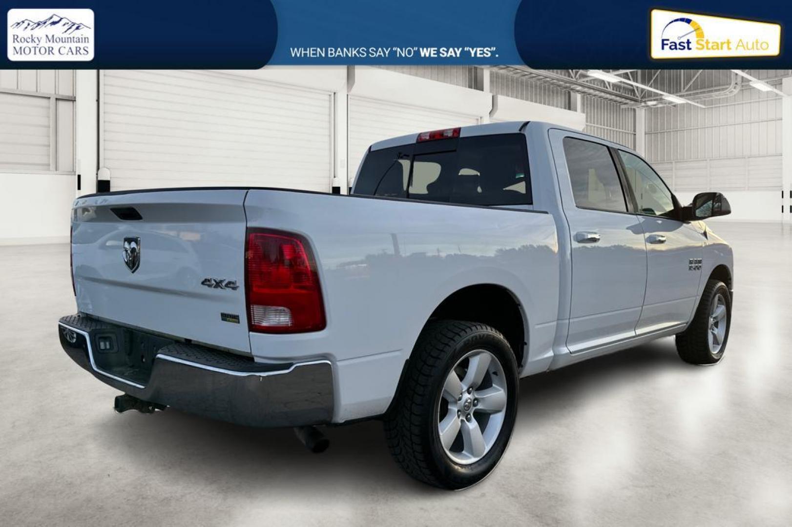 2016 White RAM 1500 SLT Crew Cab SWB 4WD (1C6RR7LG3GS) with an 3.6L V6 DOHC 24V FFV engine, 6A transmission, located at 767 S State Road, Pleasant Grove, UT, 84062, (801) 785-1058, 40.354839, -111.736687 - Photo#2