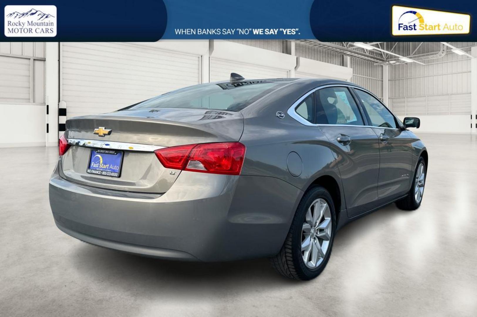 2017 Gray Chevrolet Impala LT (1G1105S3XHU) with an 3.6L V6 DOHC 24V engine, 6A transmission, located at 344 S Washington Blvd, Ogden, UT, 84404, (801) 399-1799, 41.255482, -111.970848 - Photo#2