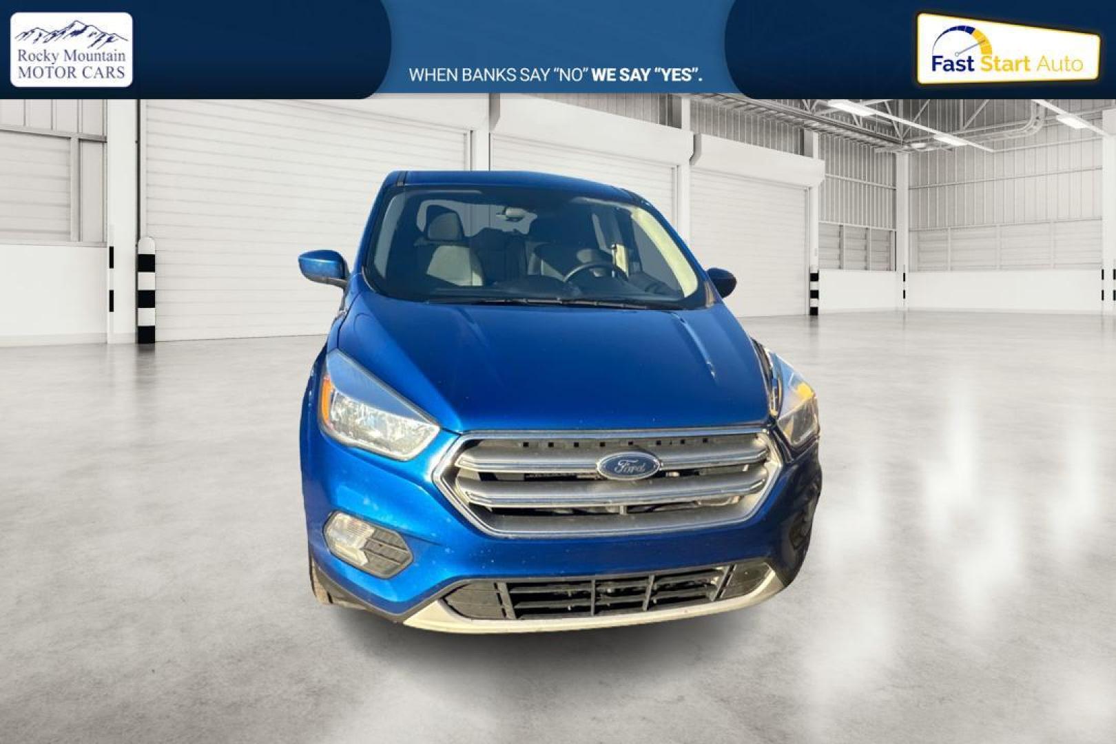 2017 Blue Ford Escape SE FWD (1FMCU0GD9HU) with an 1.5L L4 DOHC 16V engine, 6A transmission, located at 7755 State Street, Midvale, UT, 84047, (801) 753-9063, 40.610329, -111.890656 - Photo#0
