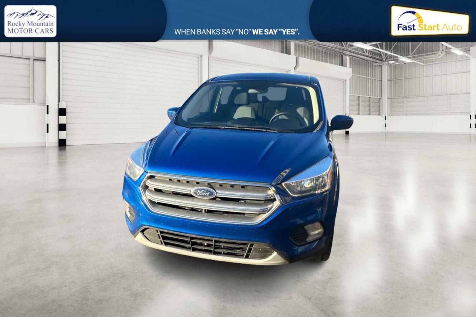 2017 Blue Ford Escape SE FWD (1FMCU0GD9HU) with an 1.5L L4 DOHC 16V engine, 6A transmission, located at 7755 State Street, Midvale, UT, 84047, (801) 753-9063, 40.610329, -111.890656 - Photo#7