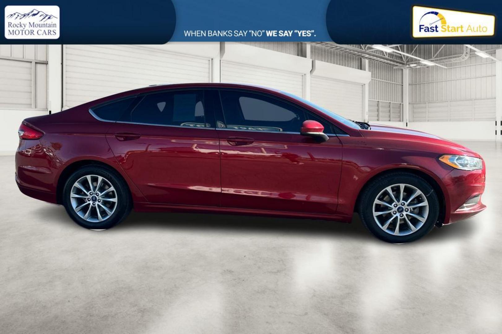 2017 Red Ford Fusion SE (3FA6P0H79HR) with an 2.5L L4 DOHC 16V engine, 6A transmission, located at 7755 State Street, Midvale, UT, 84047, (801) 753-9063, 40.610329, -111.890656 - Photo#1