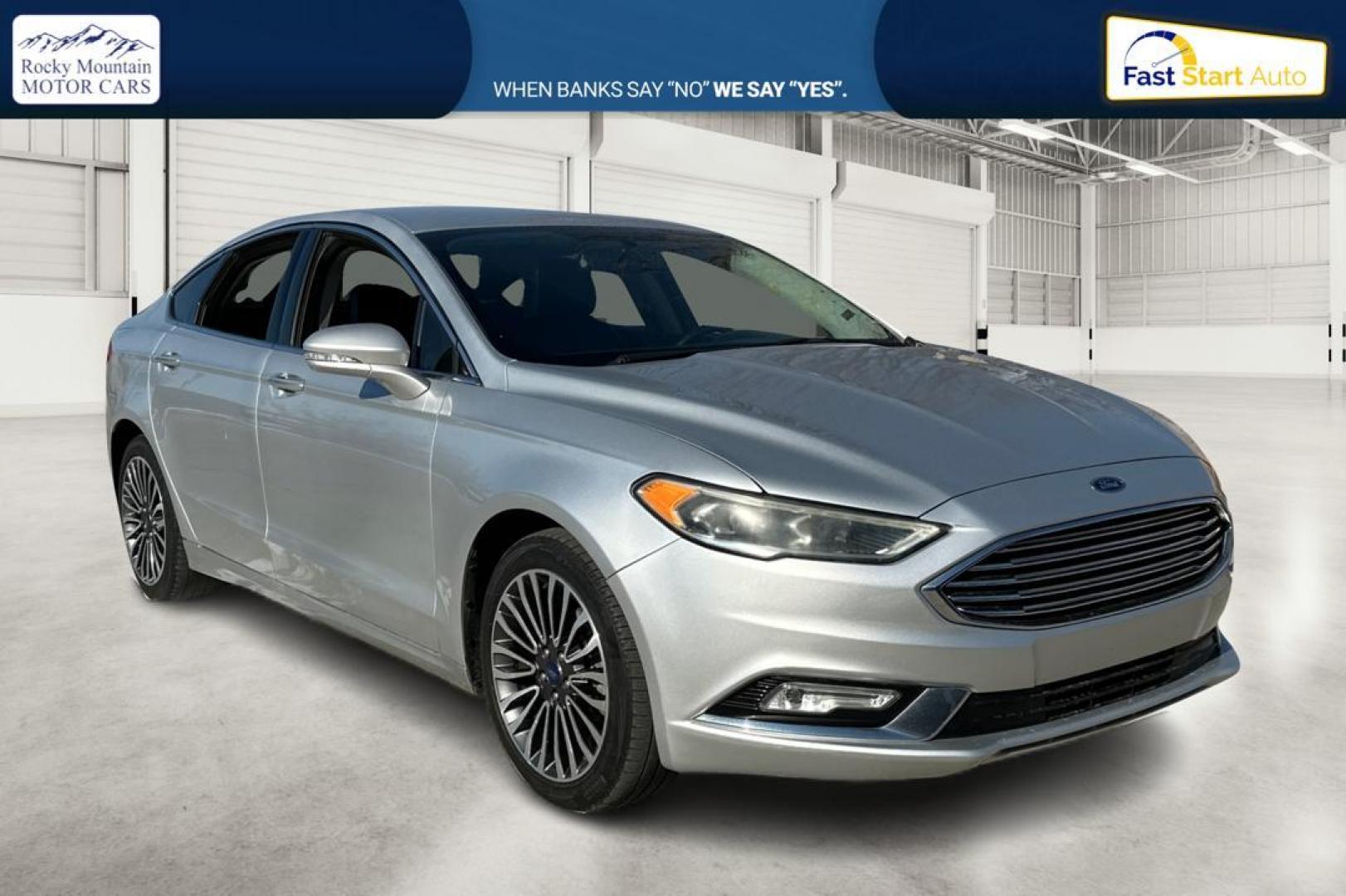 2017 Silver Ford Fusion Titanium (3FA6P0K93HR) with an 2.0L L4 DOHC 16V engine, 6A transmission, located at 7755 State Street, Midvale, UT, 84047, (801) 753-9063, 40.610329, -111.890656 - Photo#0