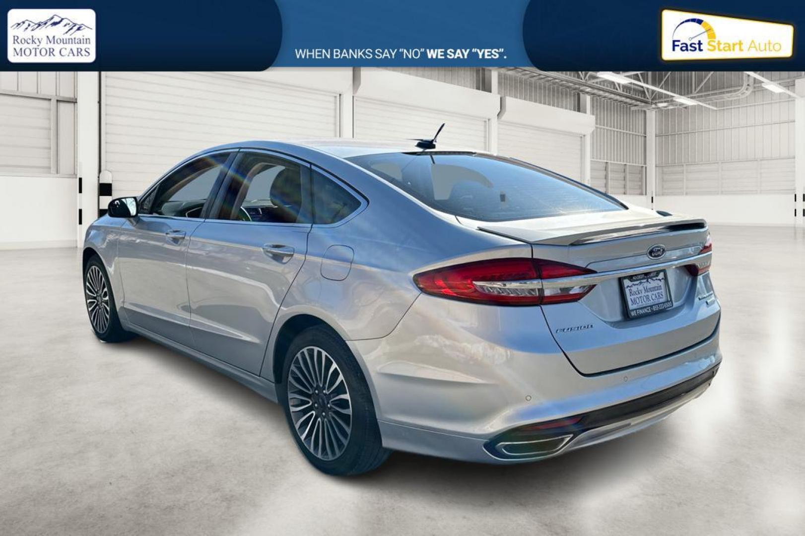 2017 Silver Ford Fusion Titanium (3FA6P0K93HR) with an 2.0L L4 DOHC 16V engine, 6A transmission, located at 7755 State Street, Midvale, UT, 84047, (801) 753-9063, 40.610329, -111.890656 - Photo#5