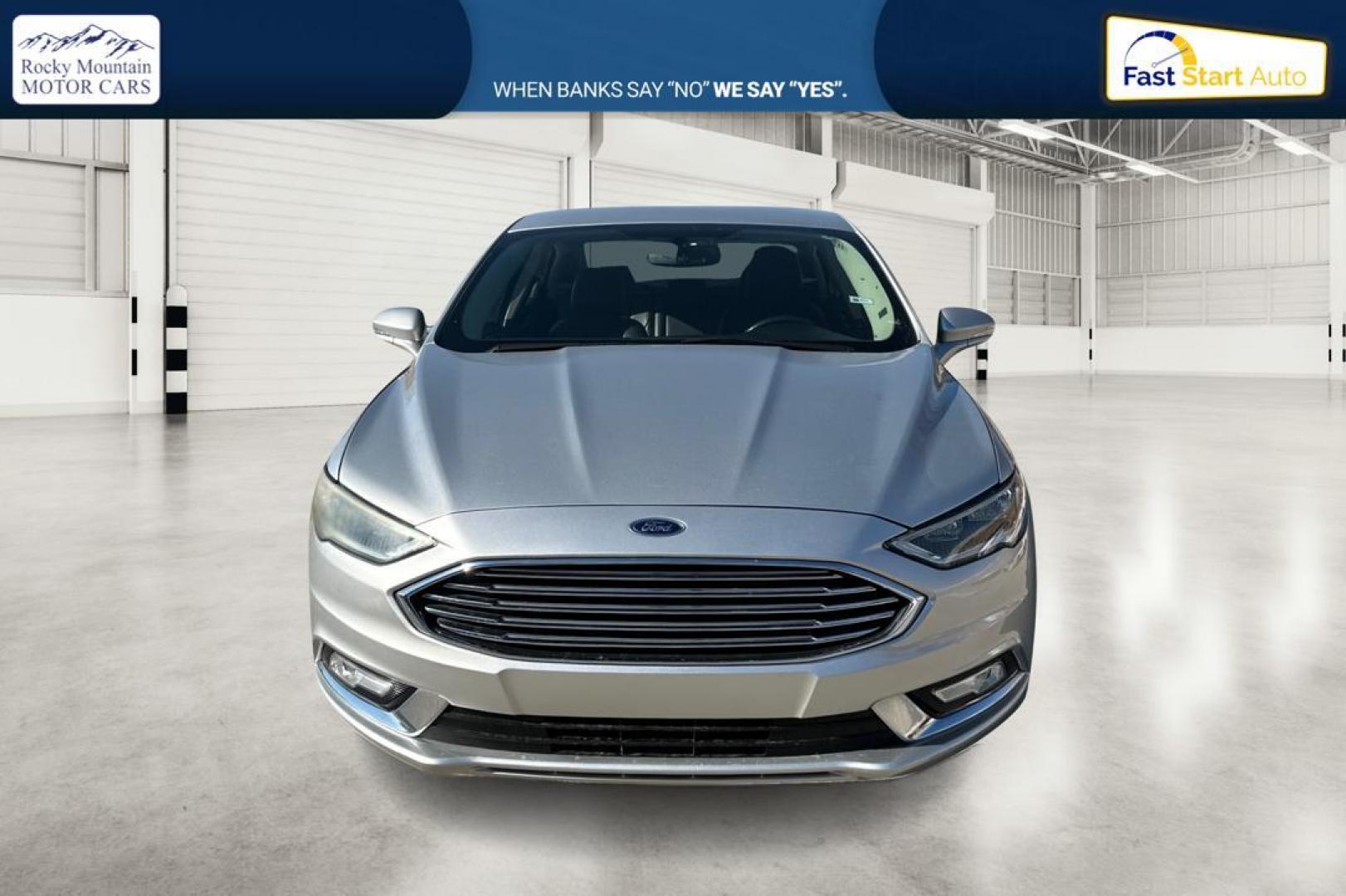 2017 Silver Ford Fusion Titanium (3FA6P0K93HR) with an 2.0L L4 DOHC 16V engine, 6A transmission, located at 7755 State Street, Midvale, UT, 84047, (801) 753-9063, 40.610329, -111.890656 - Photo#9