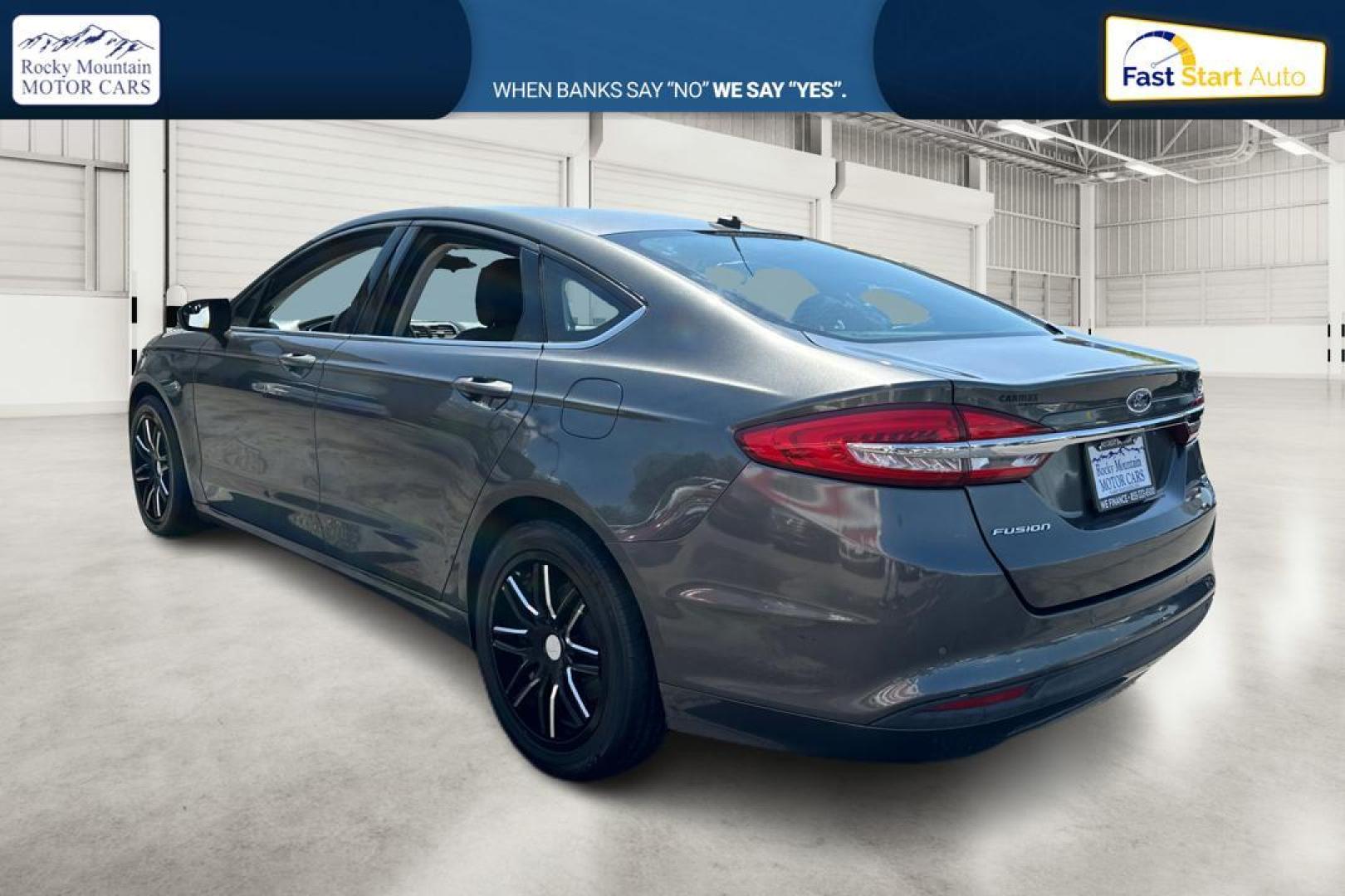 2017 Gray Ford Fusion SE (3FA6P0H76HR) with an 2.5L L4 DOHC 16V engine, 6A transmission, located at 7755 State Street, Midvale, UT, 84047, (801) 753-9063, 40.610329, -111.890656 - Photo#4