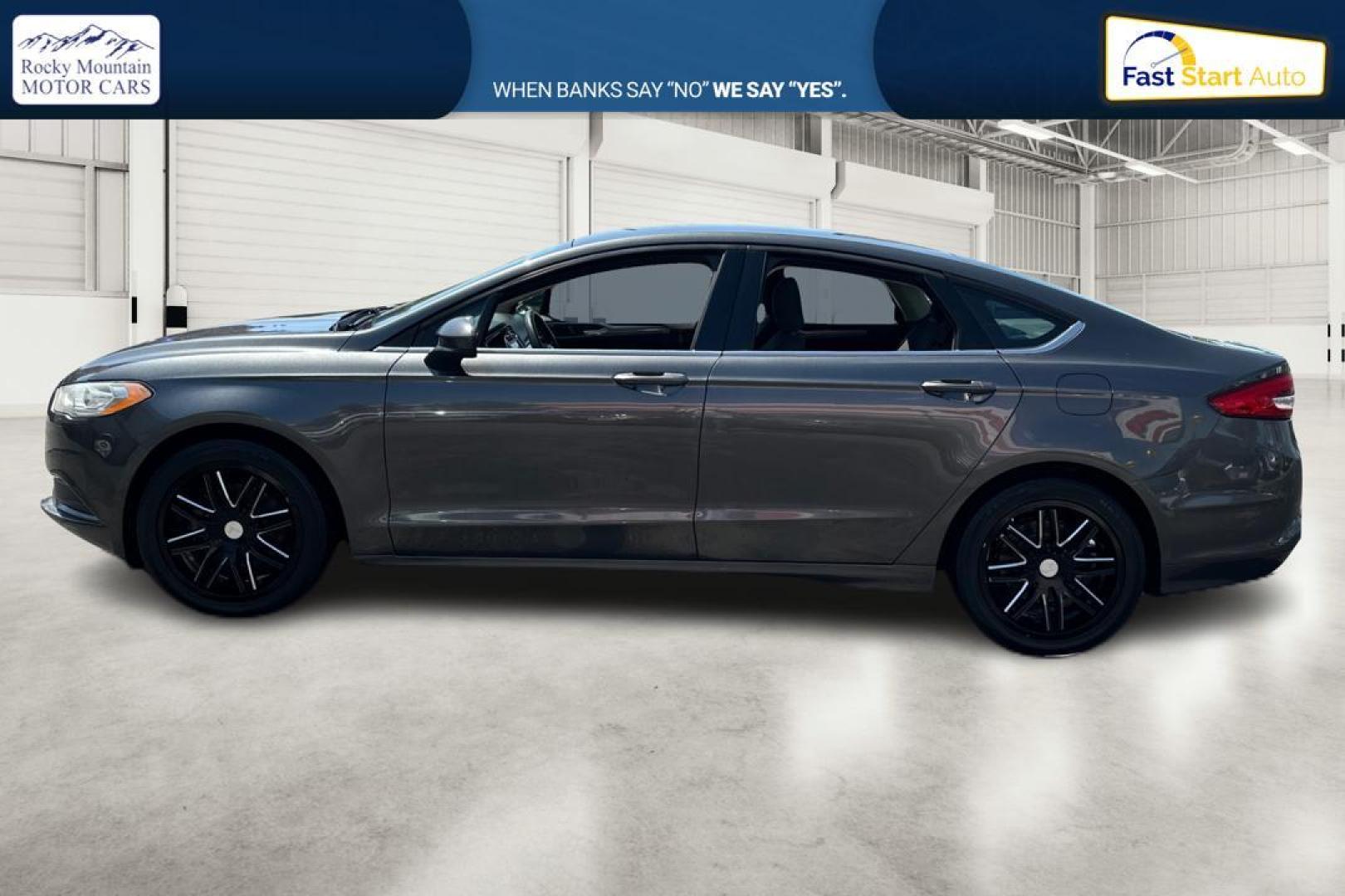 2017 Gray Ford Fusion SE (3FA6P0H76HR) with an 2.5L L4 DOHC 16V engine, 6A transmission, located at 7755 State Street, Midvale, UT, 84047, (801) 753-9063, 40.610329, -111.890656 - Photo#5