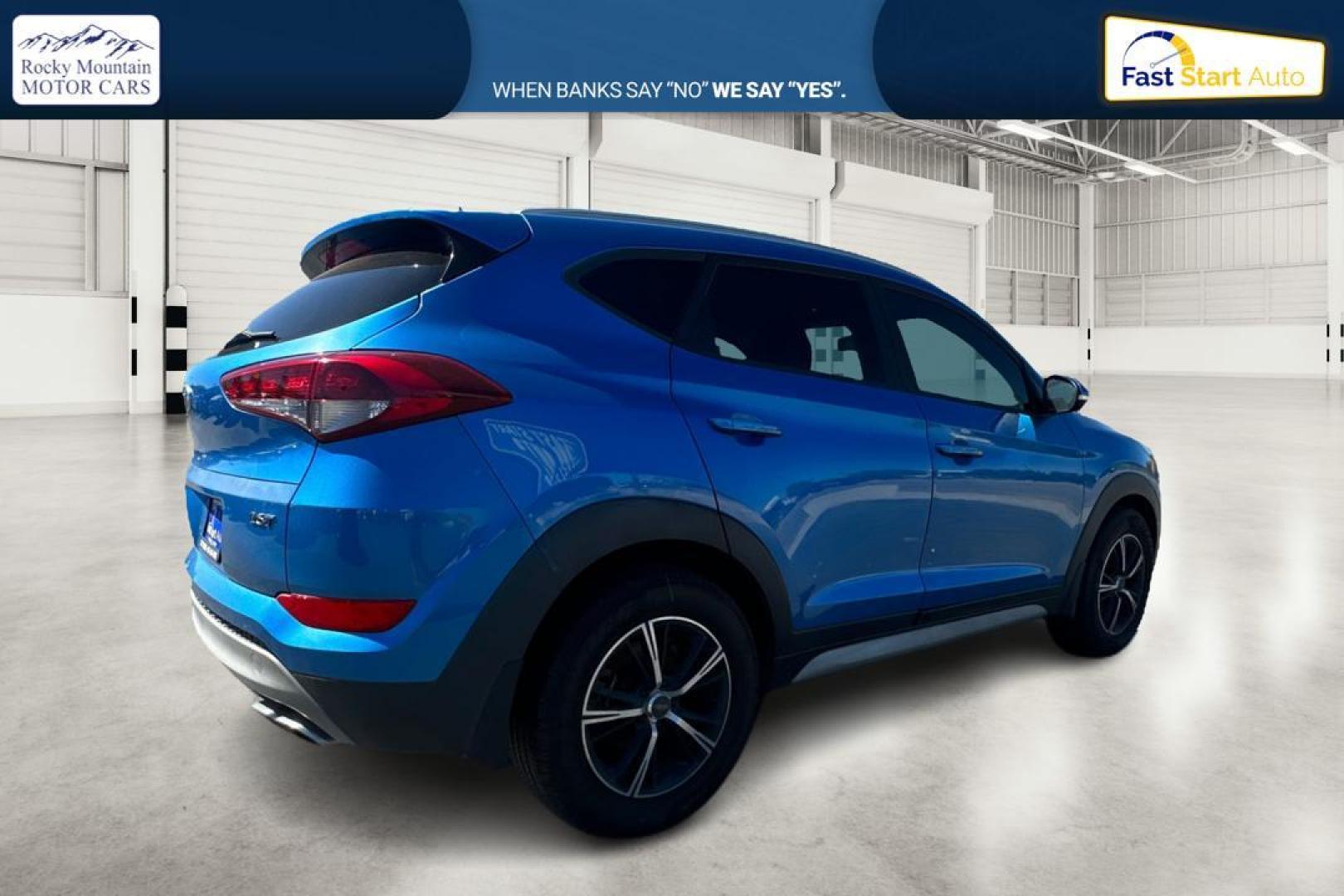 2017 Blue Hyundai Tucson Eco (KM8J33A26HU) with an 1.6L L4 DOHC 16V engine, 7A transmission, located at 767 S State Road, Pleasant Grove, UT, 84062, (801) 785-1058, 40.354839, -111.736687 - Photo#2