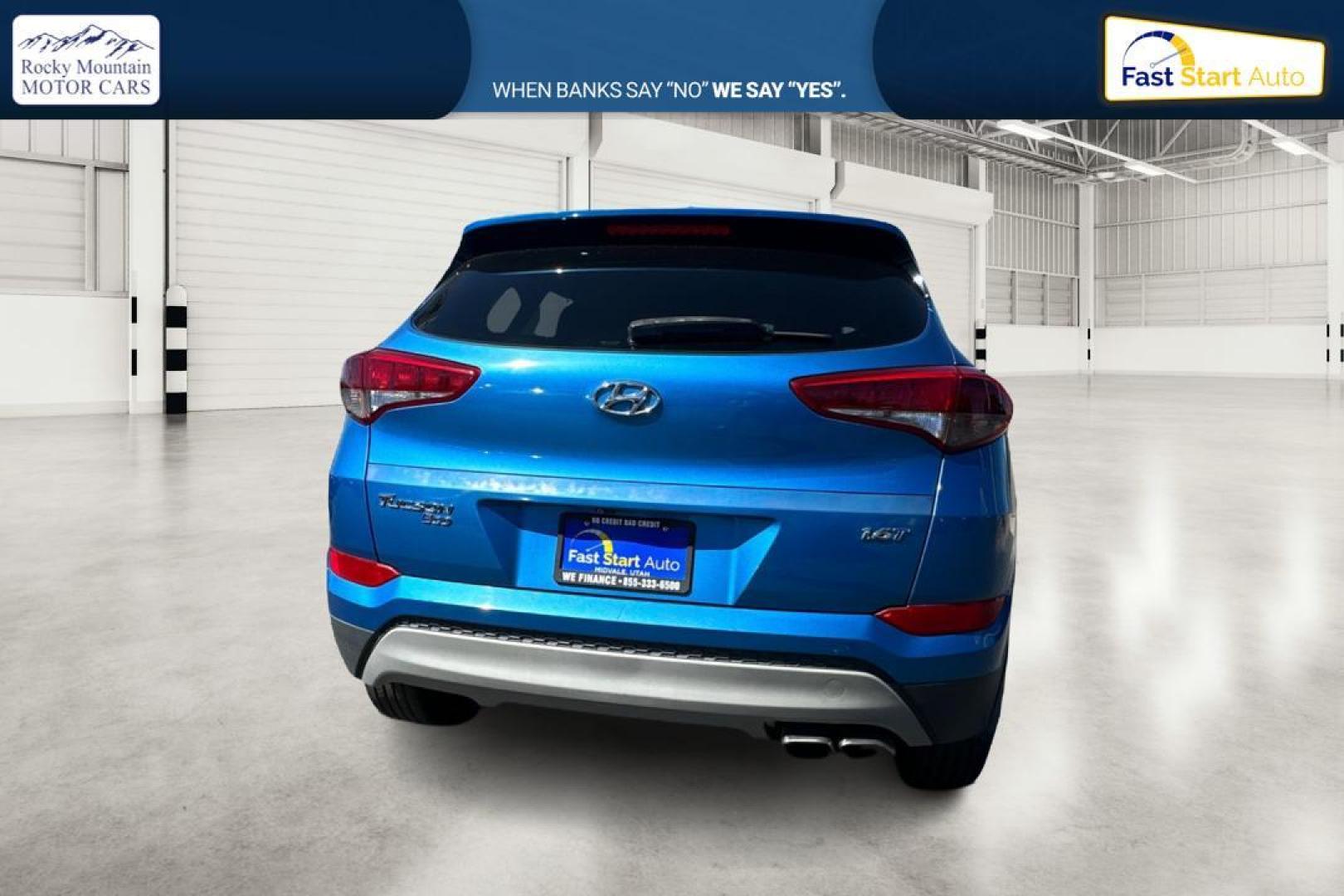 2017 Blue Hyundai Tucson Eco (KM8J33A26HU) with an 1.6L L4 DOHC 16V engine, 7A transmission, located at 767 S State Road, Pleasant Grove, UT, 84062, (801) 785-1058, 40.354839, -111.736687 - Photo#3