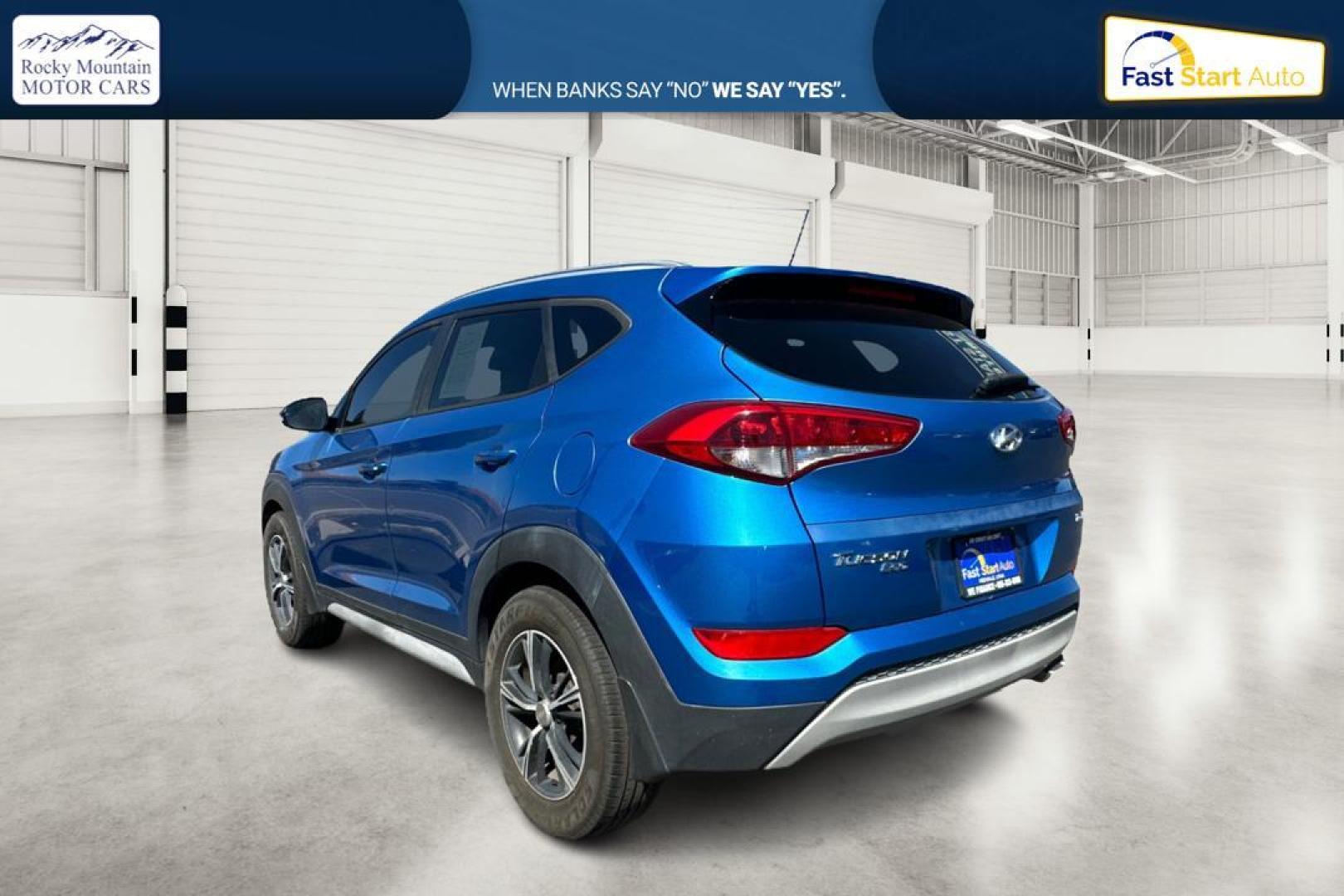 2017 Blue Hyundai Tucson Eco (KM8J33A26HU) with an 1.6L L4 DOHC 16V engine, 7A transmission, located at 767 S State Road, Pleasant Grove, UT, 84062, (801) 785-1058, 40.354839, -111.736687 - Photo#4