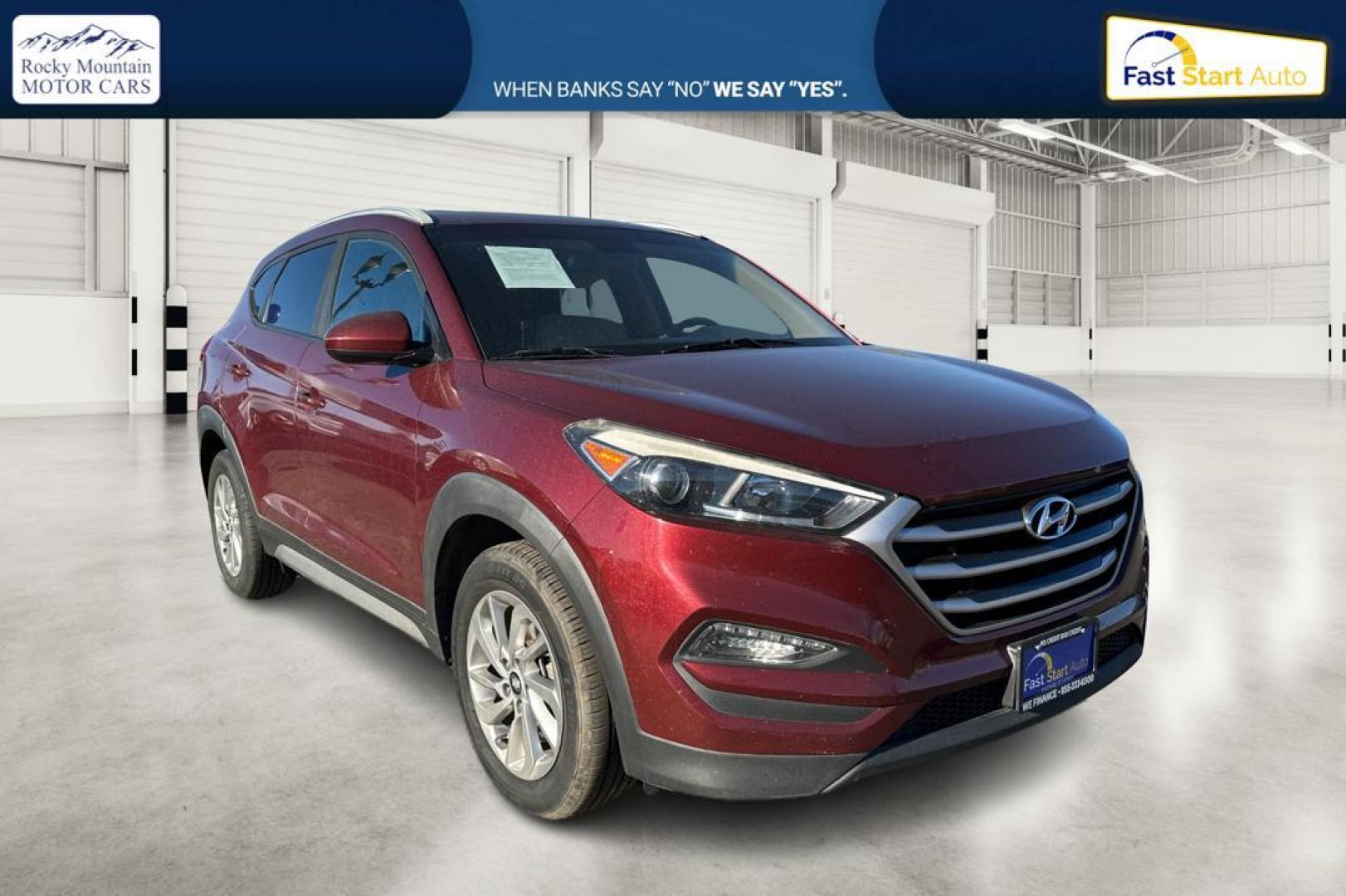 2017 Red Hyundai Tucson SE w/Preferred Package (KM8J33A46HU) with an 2.0L L4 DOHC 16V engine, 6A transmission, located at 767 S State Road, Pleasant Grove, UT, 84062, (801) 785-1058, 40.354839, -111.736687 - Photo#0